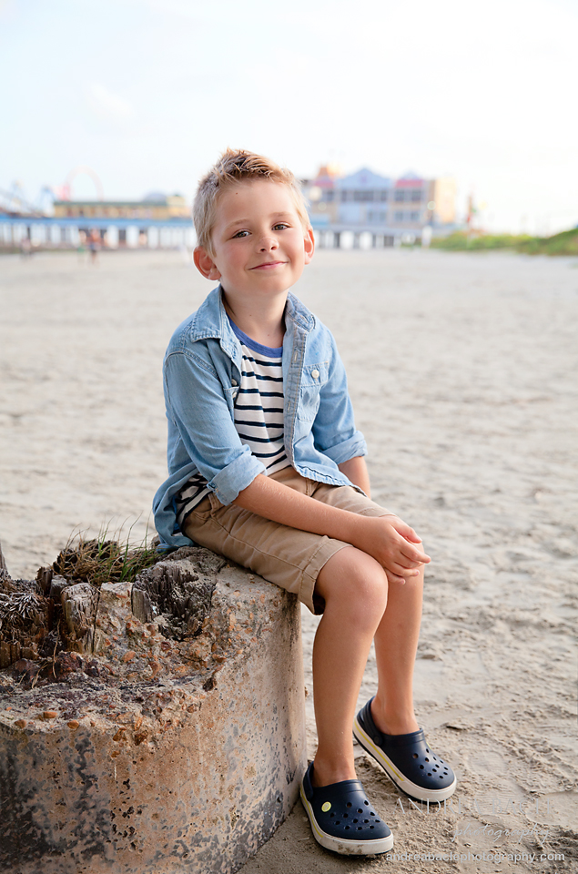 galveston family session seven year old boy by pleasure pier