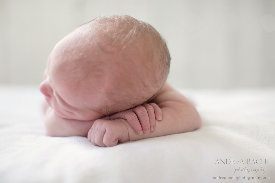 blog-post-newborn-baby-delicate-fingers-white-backdrop