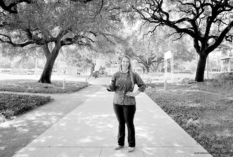 black and white kelly q holding cake discovery green