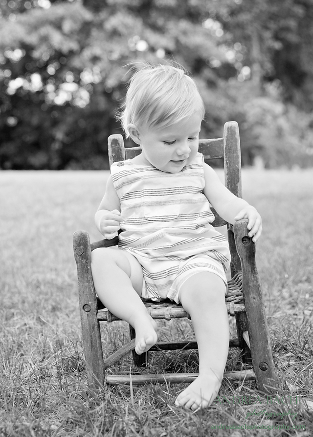 black and white heirloom family chair first birthday pics
